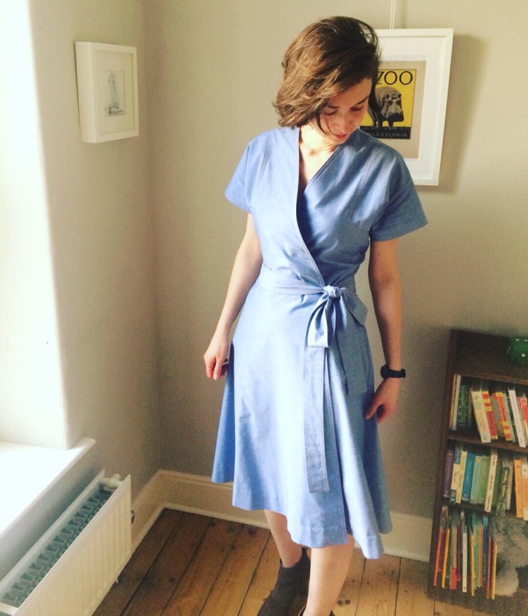 Ruth wearing a knee-length chambray wrap dress made from a vintage 1970s Maudella pattern